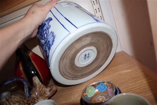 A quantity of Chinese and other porcelain including tea bowls, a bottle vase and a large blue and white brush pot